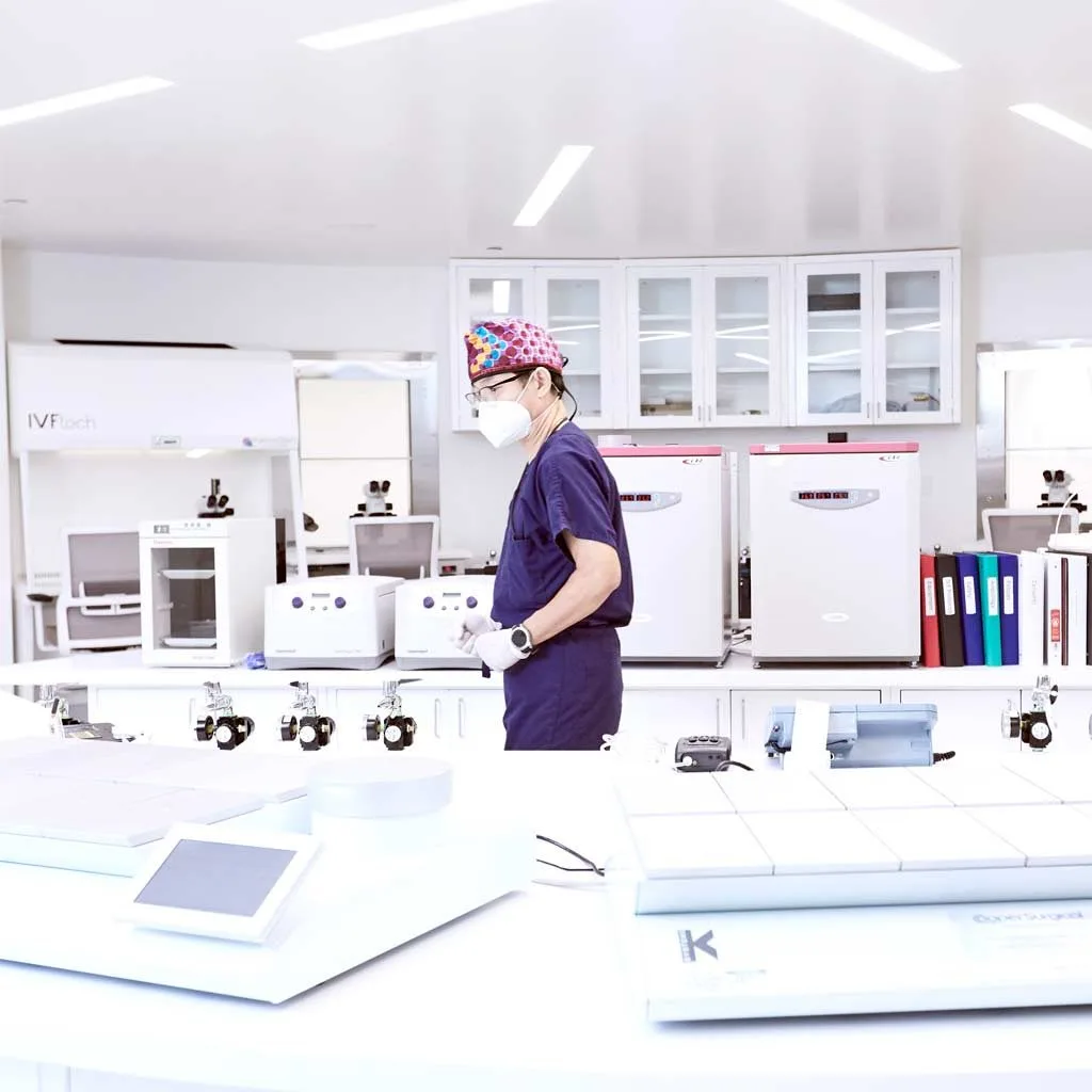 An embryologist at work in the lab